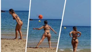chica jugando a la pelota en la playa